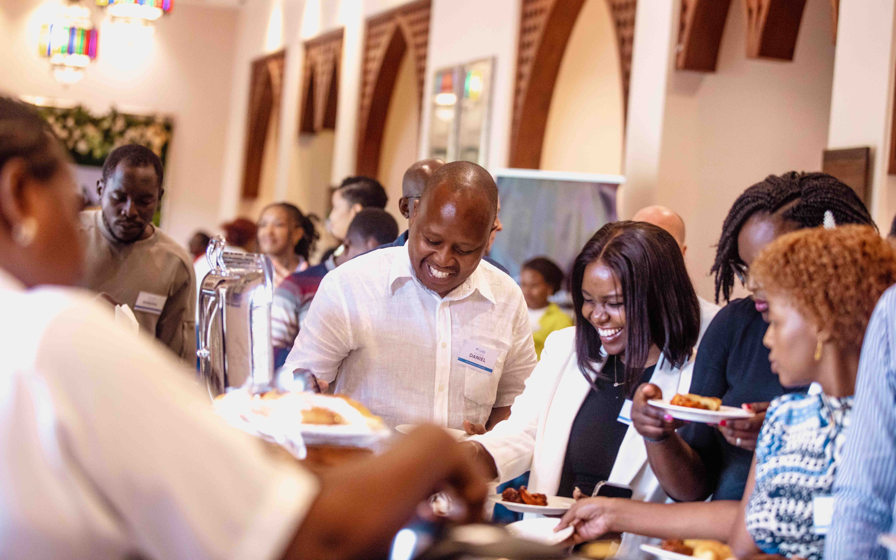 Guests share a meal at the EDEN conference