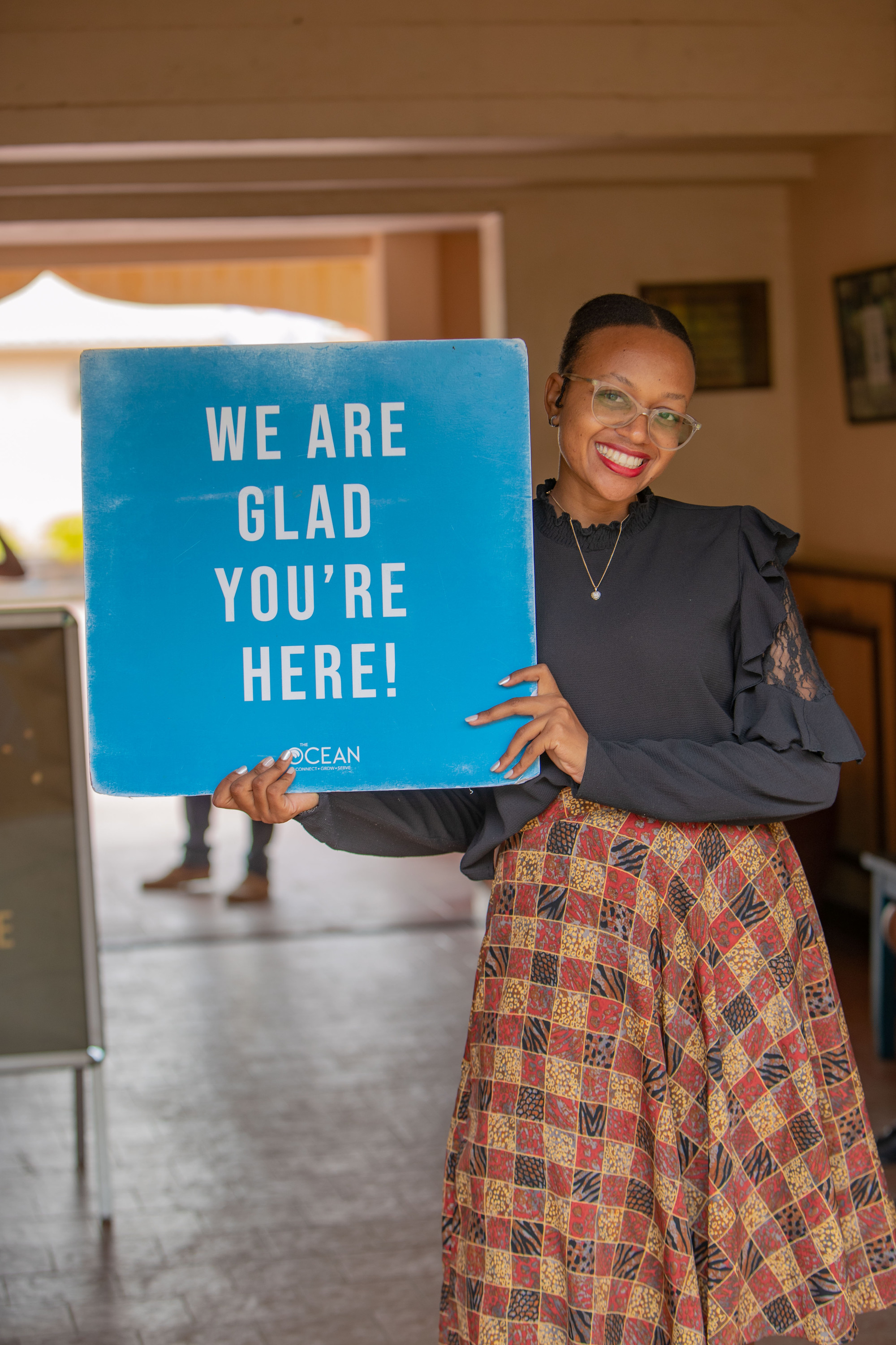 The welcome team greets a guest